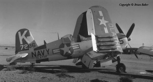 F4U-4 Corsair 97286 Olathe (2) F4U-4 Corsair NAS Olathe”, “Light Gull Gray scheme”, “Corsair restoration reference”.