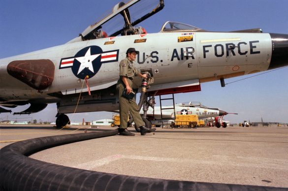 a staff sergeant refuels an f 101 voodoo aircraft from a fuel truck other f ac119e 1024