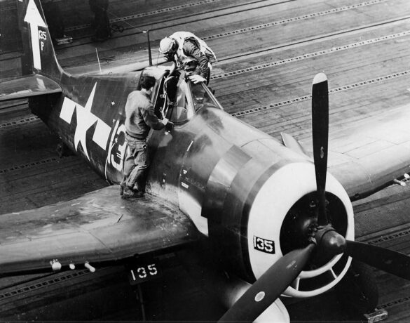 F6F 5P 135 of VF 84 on the flight deck of the aircraft carrier Bunker Hill CV 17 February 19 1945 Iwo Jima