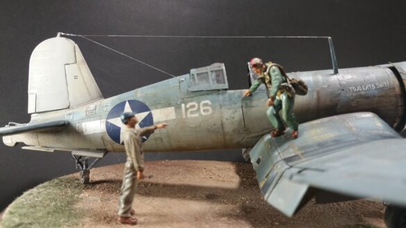 "Heavily weathered underside of F4U-1 Corsair 126 with realistic oil and dust effects simulating coral strip operations".
