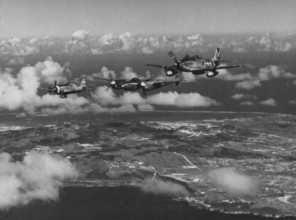 44 63423 P 51D Mustang 7AF 15FG47FS 15 Squirt Col James O Beckwith CO leads Mustangs of the 45FS over Saipan 1945 03