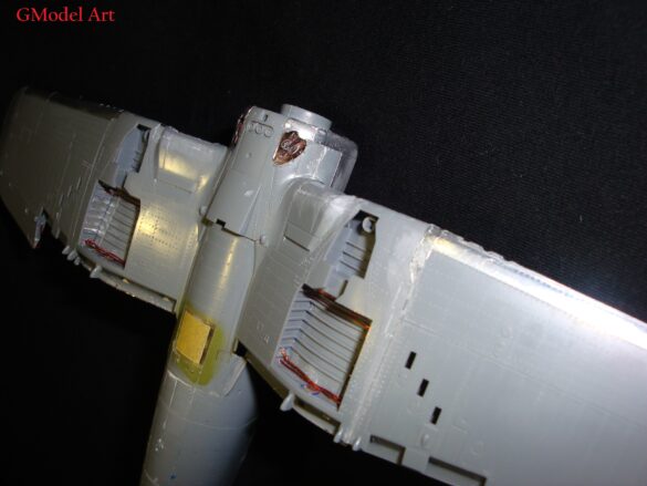 "Heavily weathered underside of F4U-1 Corsair 126 with realistic oil and dust effects simulating coral strip operations".