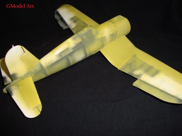 "Heavily weathered underside of F4U-1 Corsair 126 with realistic oil and dust effects simulating coral strip operations".