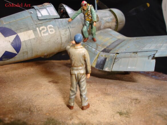 "Heavily weathered underside of F4U-1 Corsair 126 with realistic oil and dust effects simulating coral strip operations".
