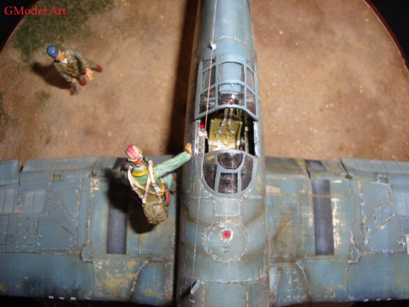 "Heavily weathered underside of F4U-1 Corsair 126 with realistic oil and dust effects simulating coral strip operations".