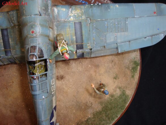 "Heavily weathered underside of F4U-1 Corsair 126 with realistic oil and dust effects simulating coral strip operations".