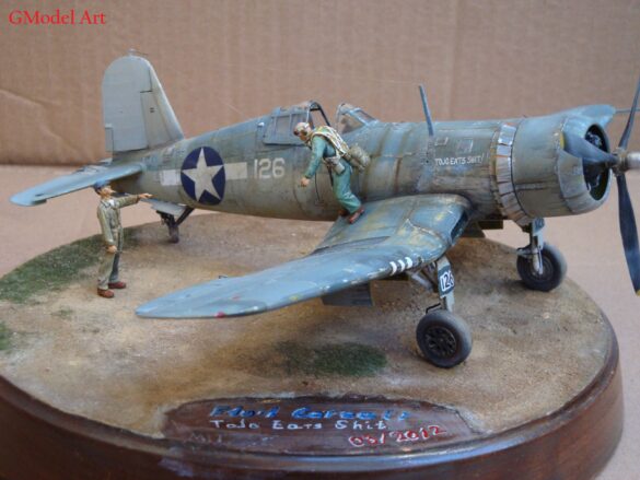 "Heavily weathered underside of F4U-1 Corsair 126 with realistic oil and dust effects simulating coral strip operations".