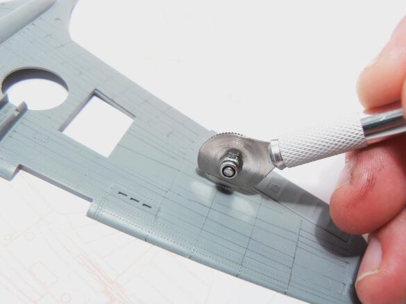 1/48 P-40M RNZAF scale model with open panels and detailed interior, expertly weathered to represent a derelict aircraft.”