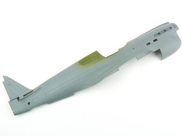 1/48 P-40M RNZAF scale model with open panels and detailed interior, expertly weathered to represent a derelict aircraft.”
