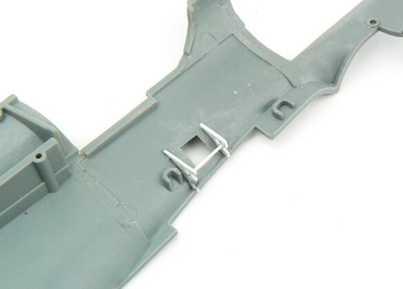 1/48 P-40M RNZAF scale model with open panels and detailed interior, expertly weathered to represent a derelict aircraft.”