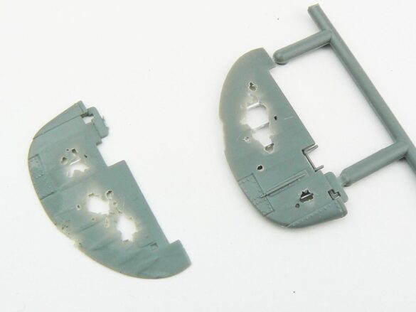 1/48 P-40M RNZAF scale model with open panels and detailed interior, expertly weathered to represent a derelict aircraft.”