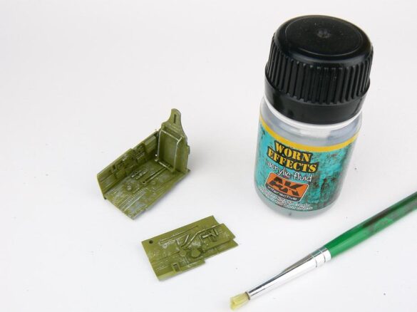 1/48 P-40M RNZAF scale model with open panels and detailed interior, expertly weathered to represent a derelict aircraft.”