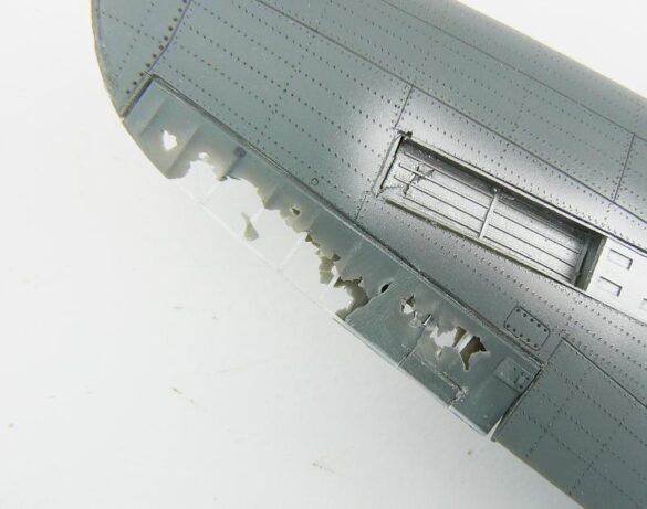 1/48 P-40M RNZAF scale model with open panels and detailed interior, expertly weathered to represent a derelict aircraft.”