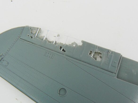 1/48 P-40M RNZAF scale model with open panels and detailed interior, expertly weathered to represent a derelict aircraft.”