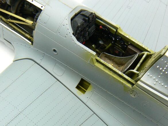 1/48 P-40M RNZAF scale model with open panels and detailed interior, expertly weathered to represent a derelict aircraft.”