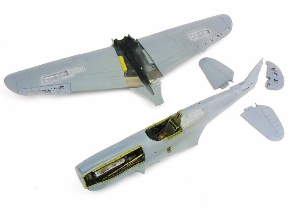 1/48 P-40M RNZAF scale model with open panels and detailed interior, expertly weathered to represent a derelict aircraft.”