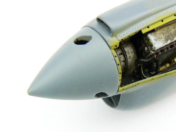 1/48 P-40M RNZAF scale model with open panels and detailed interior, expertly weathered to represent a derelict aircraft.”