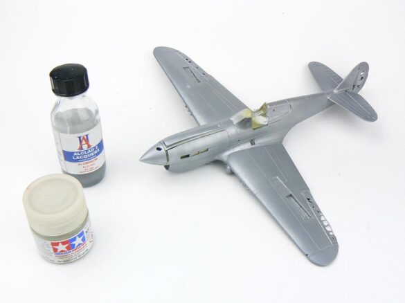 1/48 P-40M RNZAF scale model with open panels and detailed interior, expertly weathered to represent a derelict aircraft.”