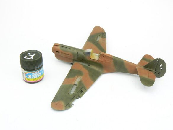 1/48 P-40M RNZAF scale model with open panels and detailed interior, expertly weathered to represent a derelict aircraft.”
