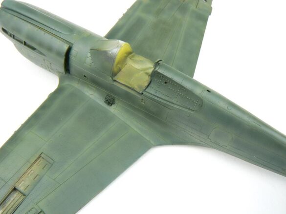 1/48 P-40M RNZAF scale model with open panels and detailed interior, expertly weathered to represent a derelict aircraft.”