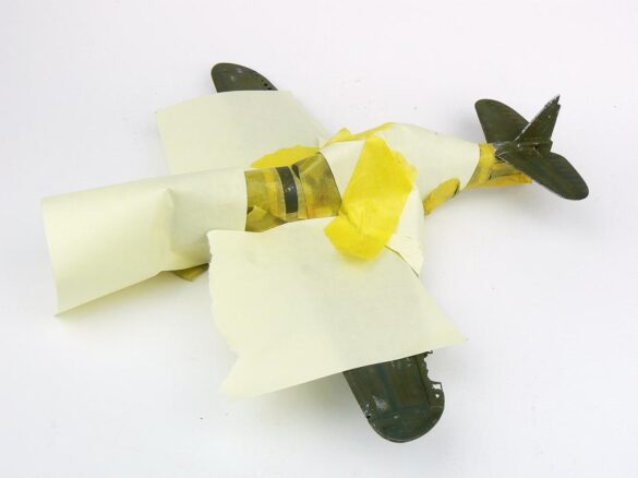 1/48 P-40M RNZAF scale model with open panels and detailed interior, expertly weathered to represent a derelict aircraft.”