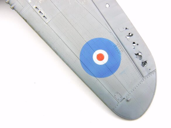 1/48 P-40M RNZAF scale model with open panels and detailed interior, expertly weathered to represent a derelict aircraft.”
