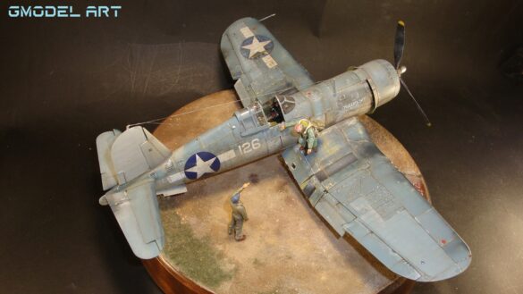 "Heavily weathered underside of F4U-1 Corsair 126 with realistic oil and dust effects simulating coral strip operations".