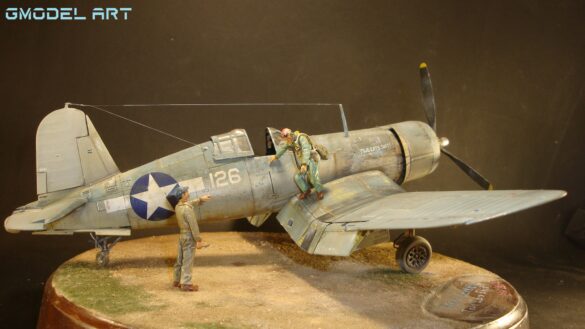 "Heavily weathered underside of F4U-1 Corsair 126 with realistic oil and dust effects simulating coral strip operations".