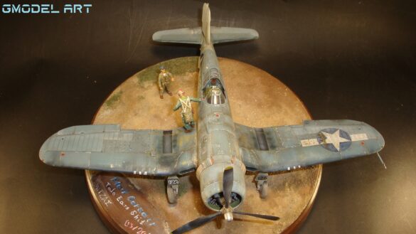"Heavily weathered underside of F4U-1 Corsair 126 with realistic oil and dust effects simulating coral strip operations".