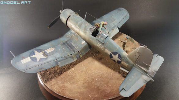 "Heavily weathered underside of F4U-1 Corsair 126 with realistic oil and dust effects simulating coral strip operations".
