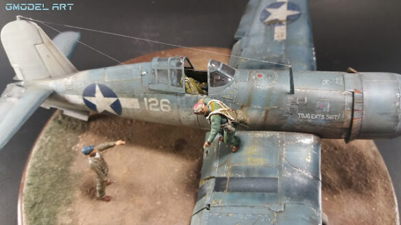 "Heavily weathered underside of F4U-1 Corsair 126 with realistic oil and dust effects simulating coral strip operations".