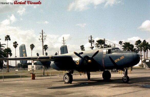 "USMC PBJ-1H Mitchell with radar pod and rocket launchers on a Pacific island, 1945"