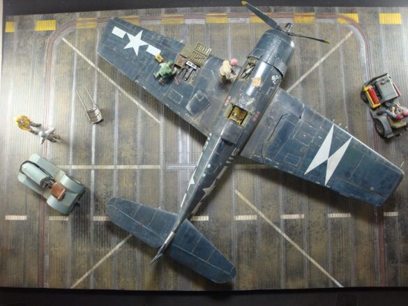 Eduard 1/48 F6F-5 Hellcat “White 115” parked on US Navy carrier deck diorama – folded wings and weathered WWII carrier fighter scene