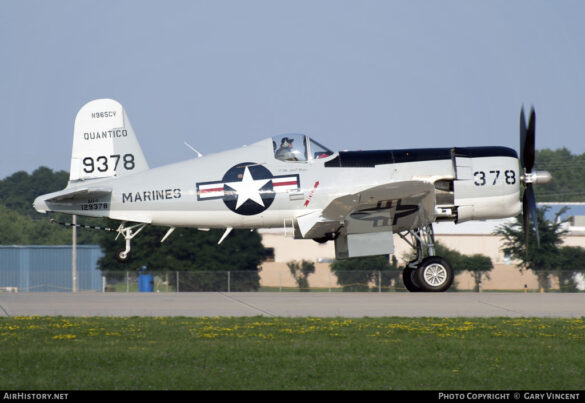“Vought AU-1 Corsair in Light Gull Gray over Insignia White parked at NAS North Island, January 1956 – side profile with underwing pylons visible.”