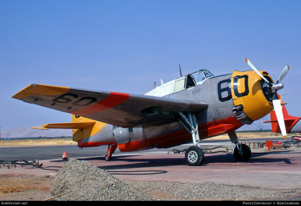 TBM Avenger Spray Plane – WWII Bomber Converted for Farming and Firefighting TBM Avenger firebomber in flight over forest fire zone – Canada, 1970s Converted TBM Avenger crop duster with yellow-red livery parked at rural airstrip Underside view of TBM with spray booms installed under wings Scale model of TBM Avenger spray plane with belly tank and weathered finish