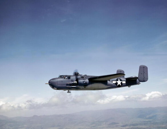 "USMC PBJ-1H Mitchell with radar pod and rocket launchers on a Pacific island, 1945"