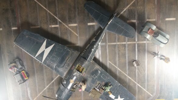 Eduard 1/48 F6F-5 Hellcat “White 115” parked on US Navy carrier deck diorama – folded wings and weathered WWII carrier fighter scene