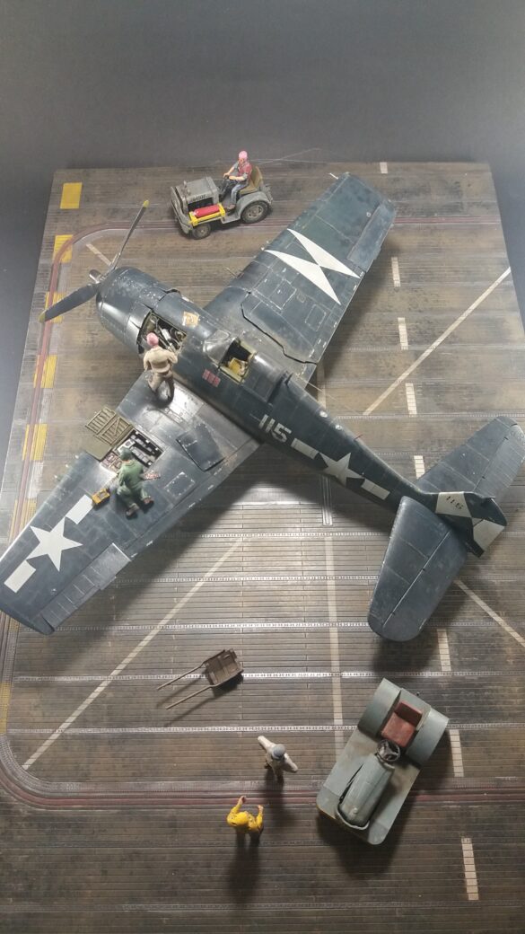 Eduard 1/48 F6F-5 Hellcat “White 115” parked on US Navy carrier deck diorama – folded wings and weathered WWII carrier fighter scene
