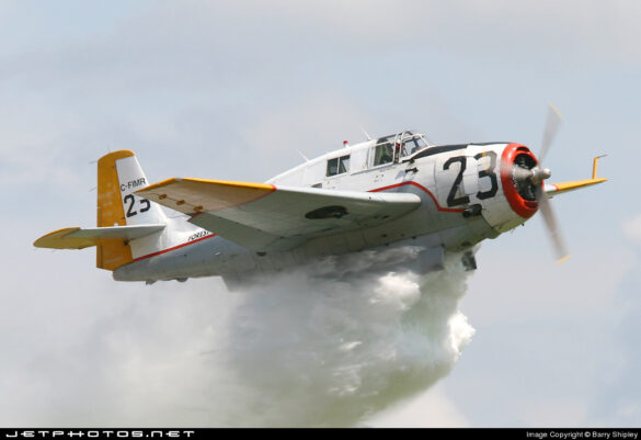 TBM Avenger Spray Plane – WWII Bomber Converted for Farming and Firefighting TBM Avenger firebomber in flight over forest fire zone – Canada, 1970s Converted TBM Avenger crop duster with yellow-red livery parked at rural airstrip Underside view of TBM with spray booms installed under wings Scale model of TBM Avenger spray plane with belly tank and weathered finish