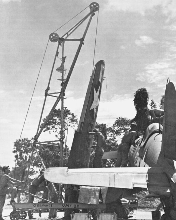 alt="1/48 scale Pacific airfield diorama with PSP and fuel truck" alt="US WW2 bomb cart and drums beside F4U Corsair" alt="Ground crew and maintenance scene on jungle runway" alt="Diorama showing GMC fuel bowser and PSP strip" alt="Scale model US bomb hoist in tropical airfield setting"