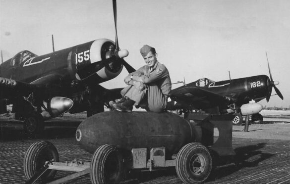 alt="1/48 scale Pacific airfield diorama with PSP and fuel truck" alt="US WW2 bomb cart and drums beside F4U Corsair" alt="Ground crew and maintenance scene on jungle runway" alt="Diorama showing GMC fuel bowser and PSP strip" alt="Scale model US bomb hoist in tropical airfield setting"