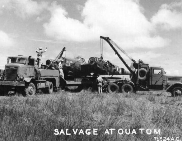 alt="1/48 scale Pacific airfield diorama with PSP and fuel truck" alt="US WW2 bomb cart and drums beside F4U Corsair" alt="Ground crew and maintenance scene on jungle runway" alt="Diorama showing GMC fuel bowser and PSP strip" alt="Scale model US bomb hoist in tropical airfield setting"