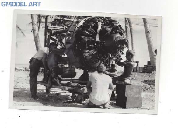 alt="1/48 scale Pacific airfield diorama with PSP and fuel truck" alt="US WW2 bomb cart and drums beside F4U Corsair" alt="Ground crew and maintenance scene on jungle runway" alt="Diorama showing GMC fuel bowser and PSP strip" alt="Scale model US bomb hoist in tropical airfield setting"