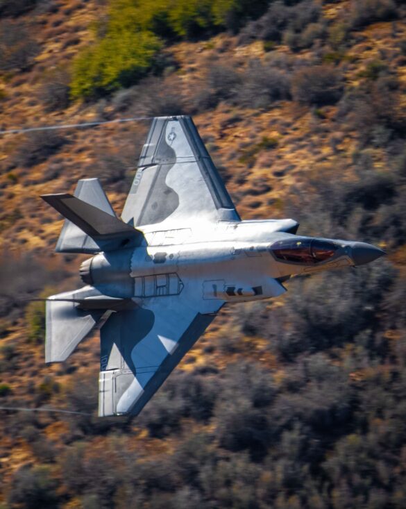 F-35C VX-9 Vampires with reflective mirror stealth coating and visible tail insignia