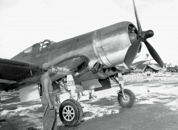 "F4U-2(N) Corsair night fighter with radar dome on right wingtip – VF(N)-101, USS Enterprise, 1944" "Modified F4U-1A Corsair converted to night fighter configuration – VMF(N)-532, Roi Island base, 1944" "US Navy F4U-2 Corsair with flame arrestors and black-over-blue night camouflage" "Close-up of AIA radar dome installed on F4U-2 wing – early WWII night fighter technology" "Cockpit interior of F4U-2(N) with Sperry autopilot and radar display"