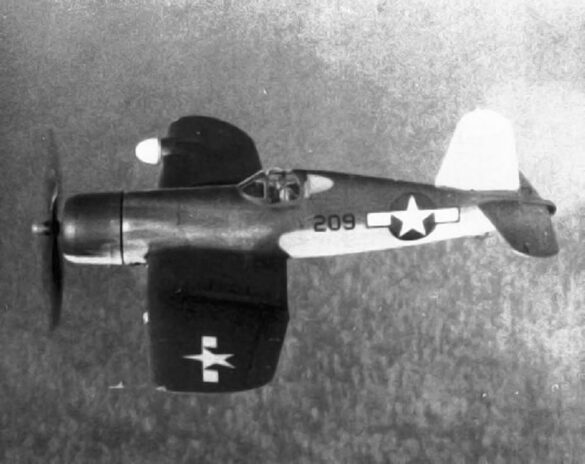 "F4U-2(N) Corsair night fighter with radar dome on right wingtip – VF(N)-101, USS Enterprise, 1944" "Modified F4U-1A Corsair converted to night fighter configuration – VMF(N)-532, Roi Island base, 1944" "US Navy F4U-2 Corsair with flame arrestors and black-over-blue night camouflage" "Close-up of AIA radar dome installed on F4U-2 wing – early WWII night fighter technology" "Cockpit interior of F4U-2(N) with Sperry autopilot and radar display"