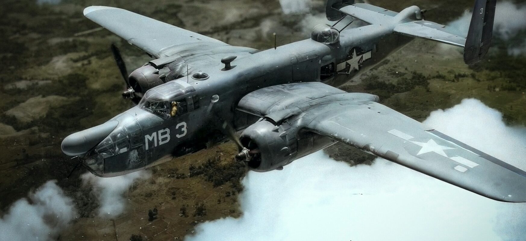 WWII "USMC PBJ-1H Mitchell with radar pod and rocket launchers on a Pacific island, 1945"