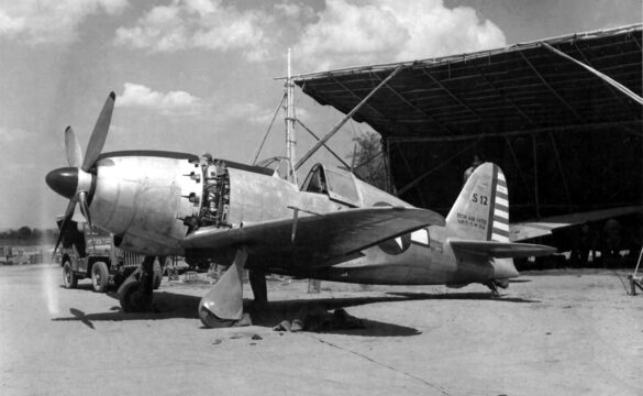 Close-up of J2M3 Raiden’s nose showing white US star insignia and propeller detail.