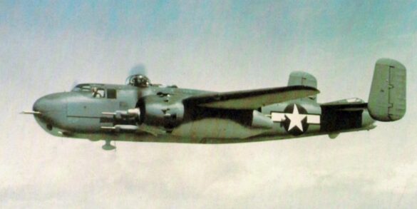 "USMC PBJ-1H Mitchell with radar pod and rocket launchers on a Pacific island, 1945"