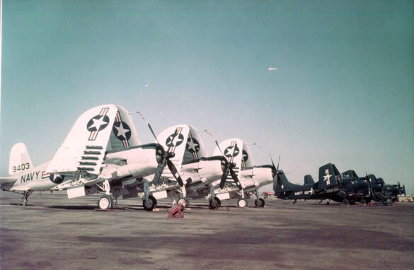 “Vought AU-1 Corsair in Light Gull Gray over Insignia White parked at NAS North Island, January 1956 – side profile with underwing pylons visible.”